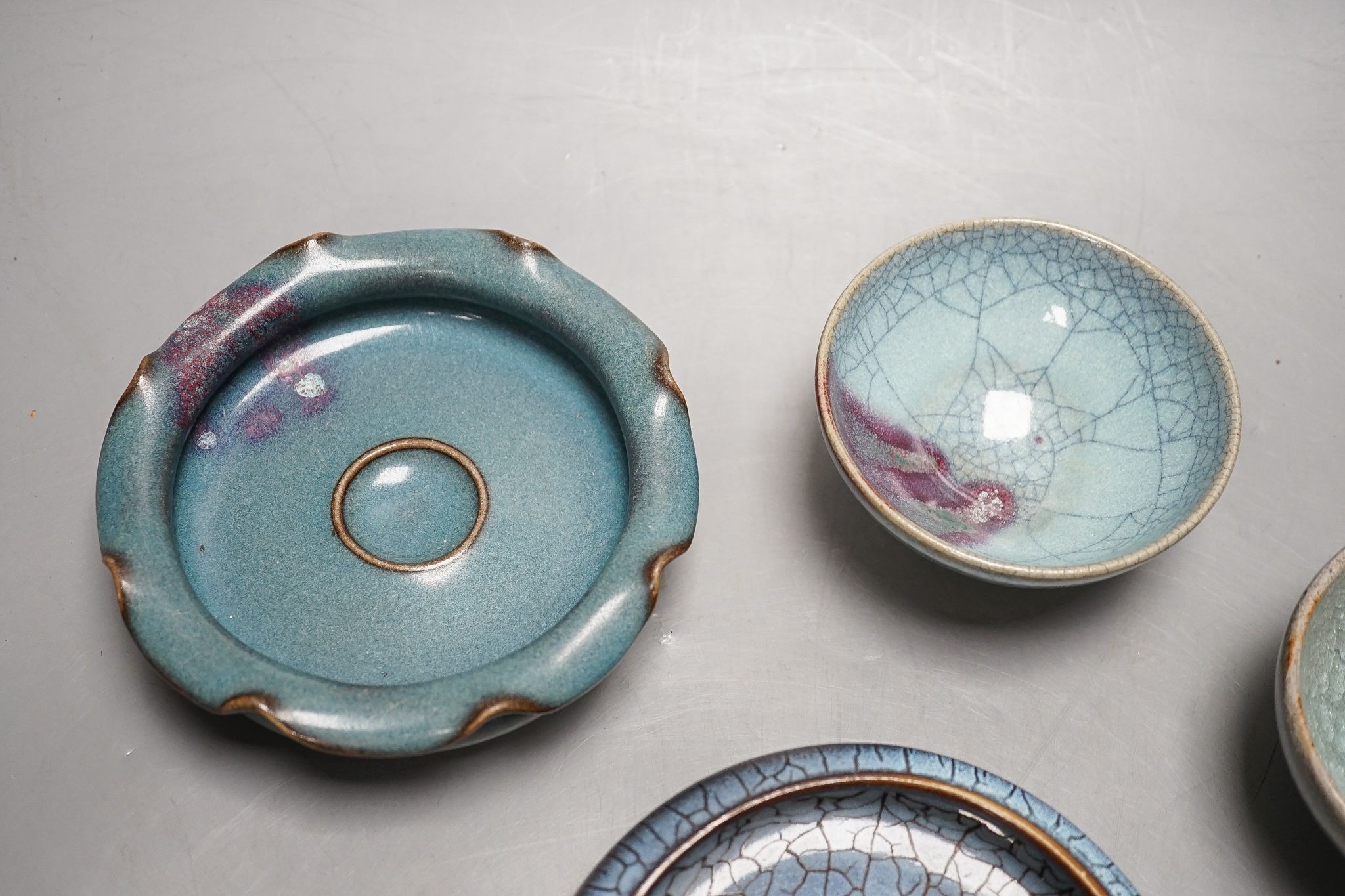 Four Chinese Jun type dishes/bowls, largest 14 cms diameter.